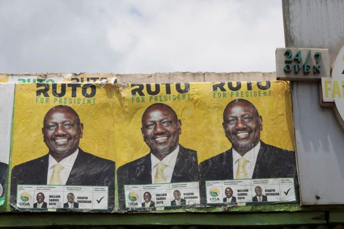 A views shows posters of Kenya's Deputy President William Ruto and presidential candidate for the United Democratic Alliance (UDA) and Kenya Kwanza political coalition on top of the Silverline Butchery restaurant in Eldoret, Kenya
