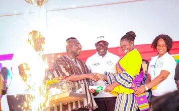 An elated Madam Stella Gyimaah Larbi greets Vice President Bawumia